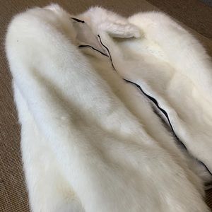 Vintage White Faux Fur Coat-

Very cool white fur coat in time for fall/winter.